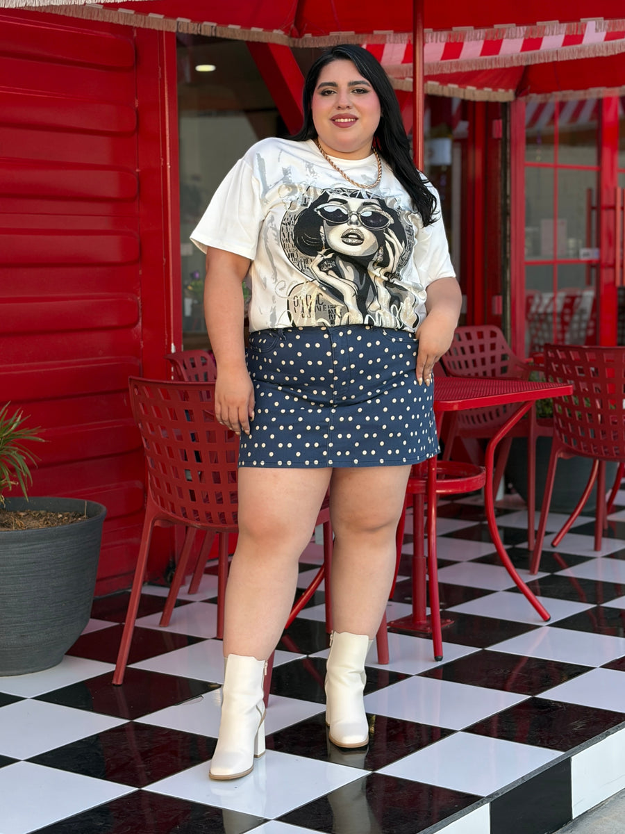 Blusa gráfica con ilustración y pedrería